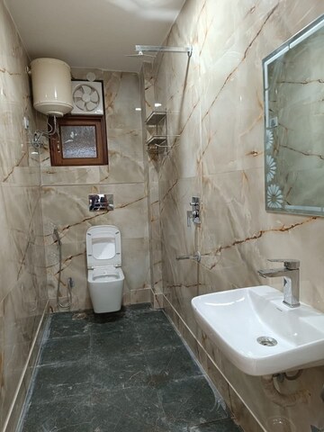 Bathroom in 1 BHK Apartment at Freedom Fighters Enclave – for Rent