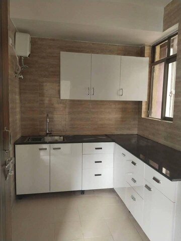 Kitchen in 3 BHK Apartment at Raheja Atharva, Sector 109 – for Sale
