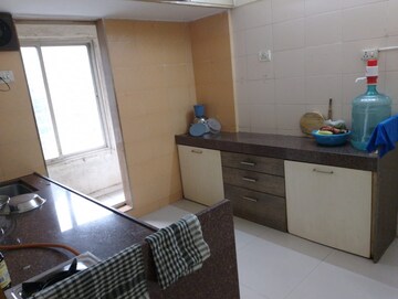 Kitchen in 2 BHK Apartment at Shanti Gardens , Mira Road – for Sale