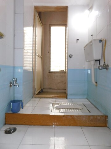 Bathroom in 2 BHK Apartment at Shanti Gardens , Mira Road – for Sale