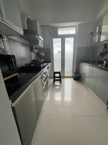 Kitchen in 3 BHK Apartment at Omkar Alta Monte, Malad East – for Rent