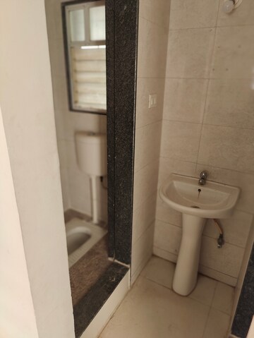 Bathroom in 2 BHK Apartment at Archana Kohinoor Glory, Mohammadwadi – for Rent