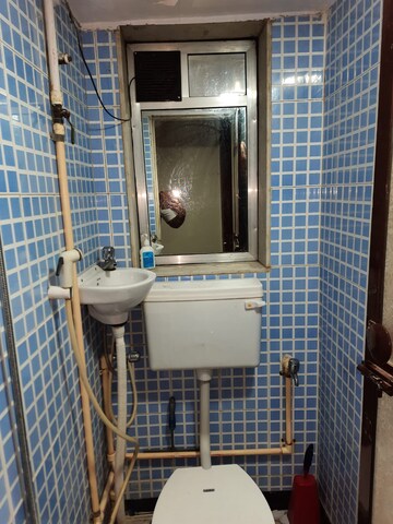 Bathroom in 2 BHK Apartment at Patel Terrace, Andheri East – for Rent