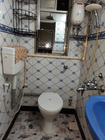 Bathroom in 2 BHK Apartment at Patel Terrace, Andheri East – for Rent
