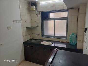 Kitchen in 1 BHK Apartment at Tilak Shanti CHS, Tilak Nagar – for Rent