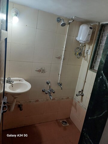 Bathroom in 1 BHK Apartment at Tilak Shanti CHS, Tilak Nagar – for Rent