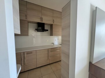 Kitchen in 2.5 BHK Apartment at Bhartiya Nikoo Homes, Thanisandra Main Road – for Rent