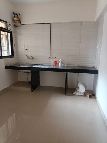 Kitchen in 2 BHK Apartment at Sanskriti Housing Society, Wakad – for Rent