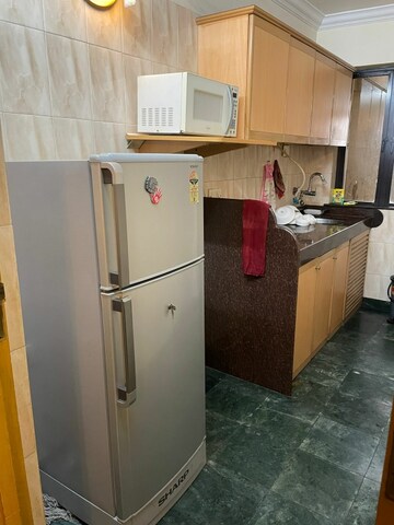 Kitchen in 2 BHK Apartment at Nav Pooja Apartment, Bandra West – for Rent