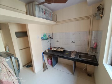 Kitchen in 1 BHK Apartment at Vijay Galaxy, Waghbil – for Rent