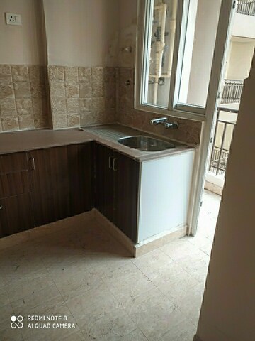 Kitchen in 2 BHK Apartment at Prateek Grand City, Siddharth Vihar – for Rent