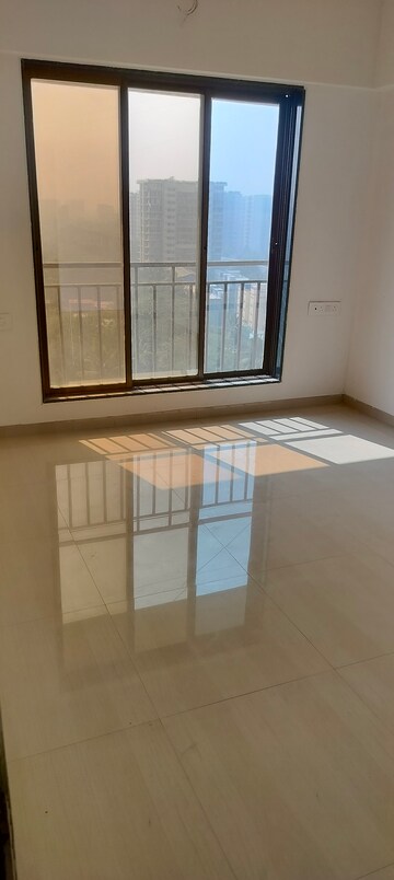 Room in 2 BHK Apartment at Nirmaan Shivneri CHS, Andheri West – for Sale