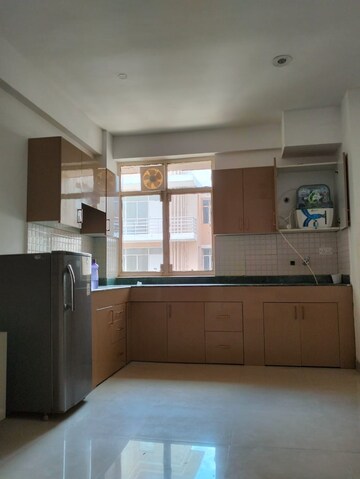 Kitchen in 2 BHK Apartment at Breez Global Heights, Sohna Sector 33 – for Rent