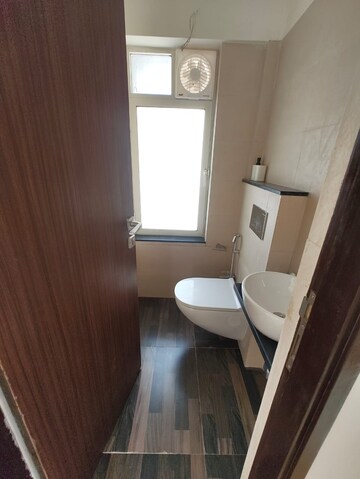 Bathroom in 1 BHK Apartment at Omkar Signet, Malad East – for Rent