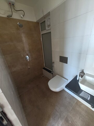 Bathroom in 1 BHK Apartment at Omkar Signet, Malad East – for Rent