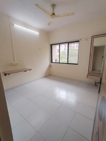 Bedroom in 1 BHK Apartment at Parijat Gardens Marigold CHS, Kasarvadavali – for Sale