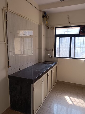 Kitchen in 2 BHK Apartment at Acme Ozone, Manpada – for Rent