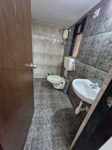 Bathroom in 1 BHK Apartment at Ekta Brooklyn Park, Virar West – for Rent