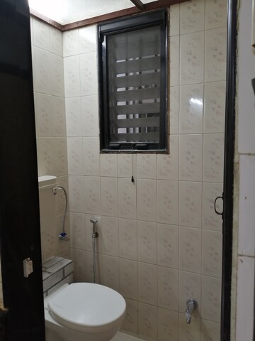 Bathroom in 2 BHK Apartment at Vasant Chandan CHS, Vasant Vihar – for Rent
