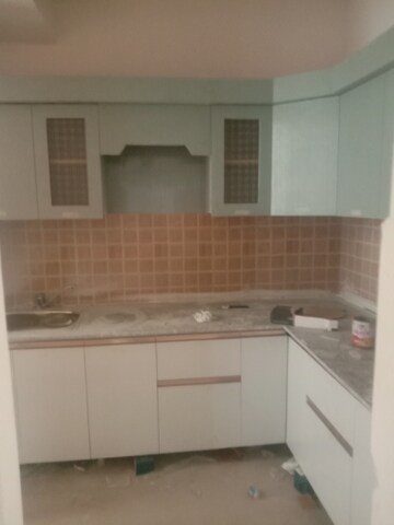 Kitchen in 2 BHK Apartment at Mahagun Mywoods, Sector 16c Greater Noida – for Rent