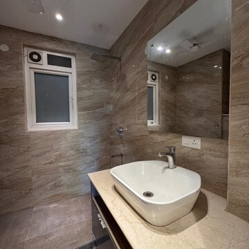 Bathroom in 4 BHK Builder Floor at Ansal Sushant Lok I, Sector 43 – for Rent