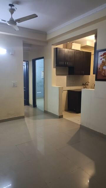 Living Room in 2 BHK Apartment at Amrapali Silicon City, Sector 76 – for Rent