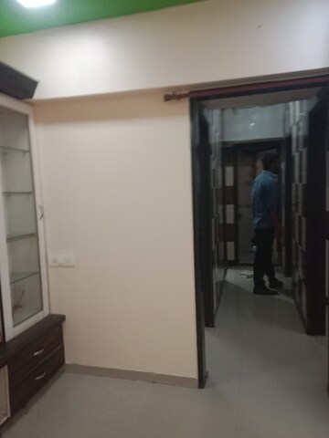 Living Room in 2 BHK Apartment at Maan Shivneri CHS, Bhandup West – for Rent