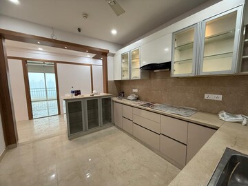 Kitchen in 4 BHK Apartment at Mahagun Mezzaria, Sector 78 – for Sale