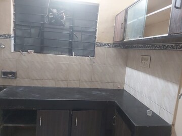 Kitchen in 1 BHK Apartment at Bund Garden – for Rent
