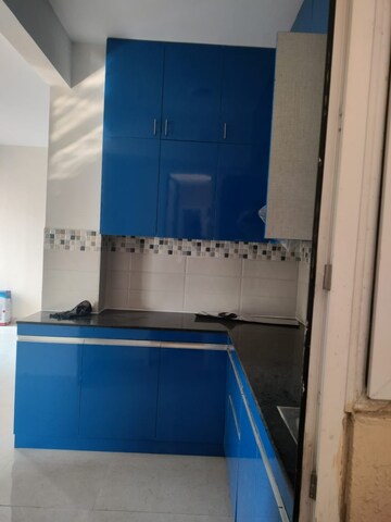 Kitchen in 2 BHK Apartment at Signature Global The Millennia, Sector 37d – for Rent