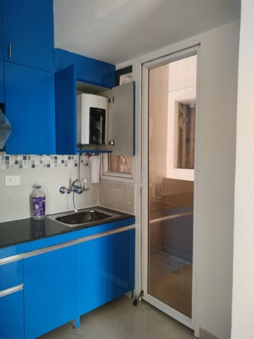 Kitchen in 2 BHK Apartment at Signature Global The Millennia, Sector 37d – for Rent