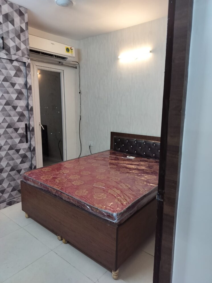 Bedroom, signature-global-the-millennia 2 Bedroom 644 Sq.Ft. Apartment In Sector 37d Gurgaon 8021372