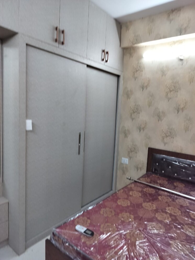 Bedroom, signature-global-the-millennia 2 Bedroom 644 Sq.Ft. Apartment In Sector 37d Gurgaon 8021372