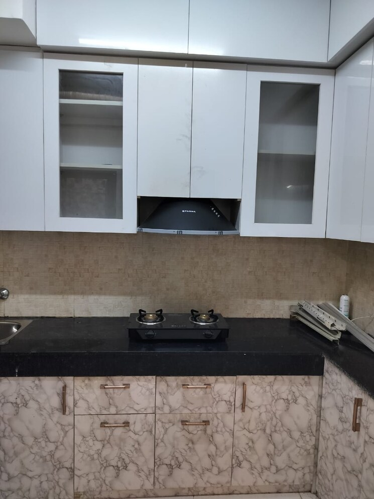 Kitchen, signature-global-the-millennia 2 Bedroom 644 Sq.Ft. Apartment In Sector 37d Gurgaon 8021372