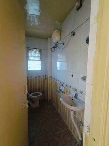 Bathroom in 2 BHK Apartment at Punyadham Society, Wadgaon Sheri – for Rent