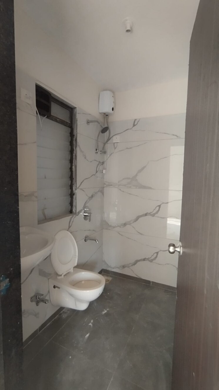 Bathroom, raunak-city-sector-4-d5 2 Bedroom 650 Sq.Ft. Apartment In Khadakpada Thane 8021472