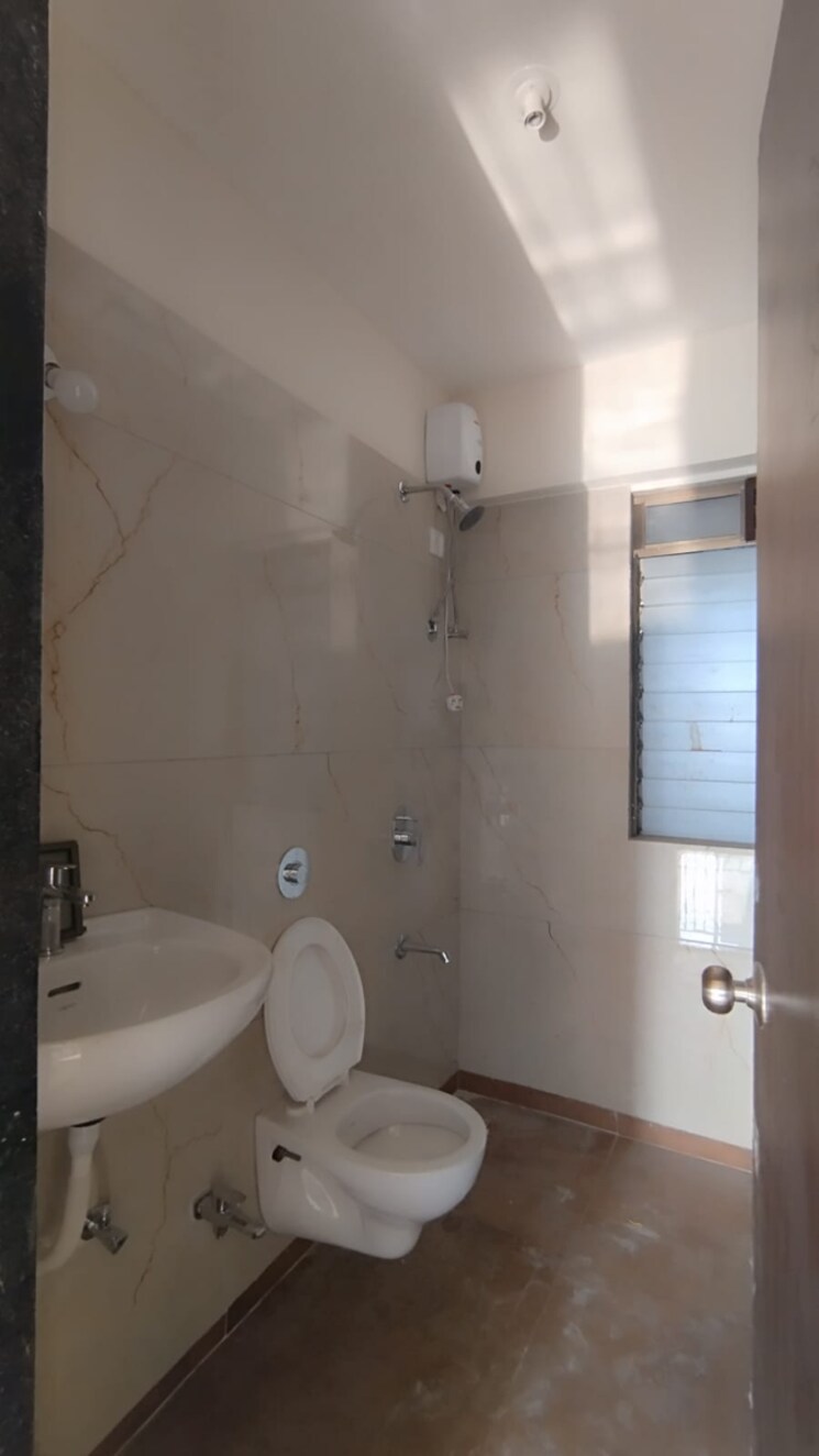 Bathroom, raunak-city-sector-4-d5 2 Bedroom 650 Sq.Ft. Apartment In Khadakpada Thane 8021472