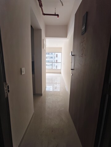 Building Lobby in 2 BHK Apartment at Piramal Vaikunth, Balkum Pada – for Rent