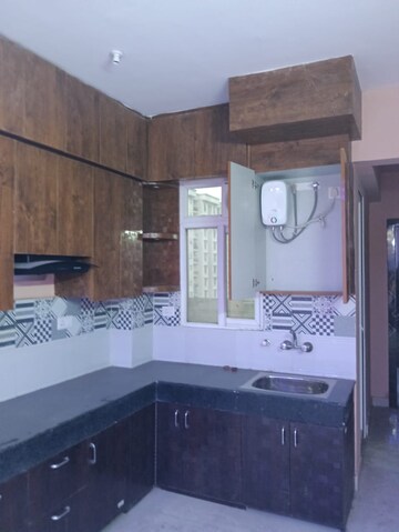 Kitchen in 2 BHK Apartment at Signature The Serenas, Sohna Sector 36 – for Rent