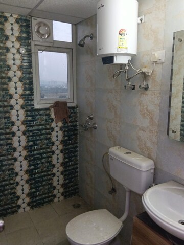 Bathroom in 2 BHK Apartment at Signature The Serenas, Sohna Sector 36 – for Rent