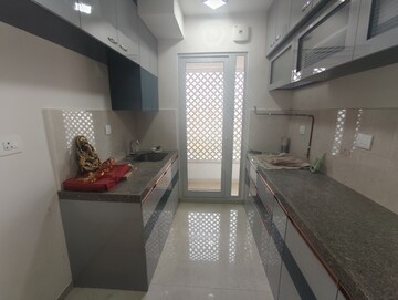 Kitchen in 2 BHK Apartment at Piramal Vaikunth, Balkum Pada – for Rent
