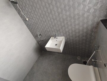 Bathroom in 2 BHK Apartment at Ashar Axis, Majiwada – for Rent
