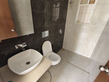 Bathroom in 1.5 BHK Apartment at Dosti West County, Balkum Pada – for Rent