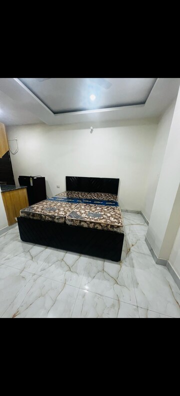 Bedroom in Studio Builder Floor at Ansal Sushant Lok I, Sector 43 – for Rent