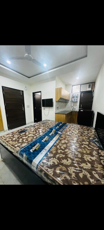 Bedroom in Studio Builder Floor at Ansal Sushant Lok I, Sector 43 – for Rent
