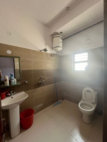 Bathroom in 3 BHK Builder Floor at Sahastradhara Road – for Sale