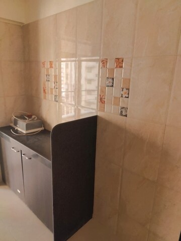 Kitchen in 1 BHK Apartment at Ruparel Sereno, Vasai East – for Sale