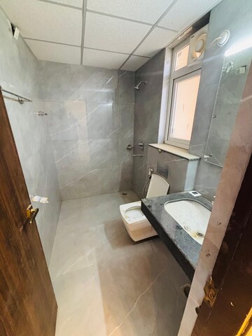 Bathroom in 3 BHK Apartment at Rishita Manhattan, Gomti Nagar – for Rent