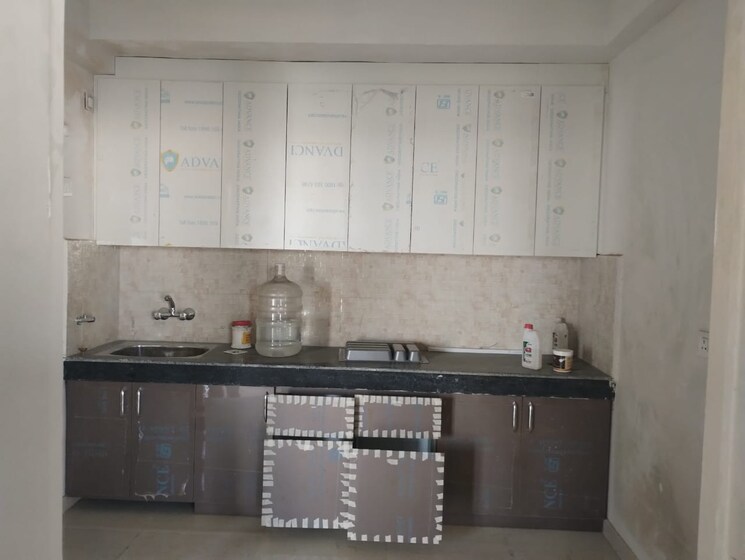 Kitchen, signature-global-the-millennia 2 Bedroom 644 Sq.Ft. Apartment In Sector 37d Gurgaon 8023066