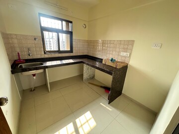 Kitchen in 1 BHK Apartment at Dosti Planet North Onyx, Shilphata – for Sale